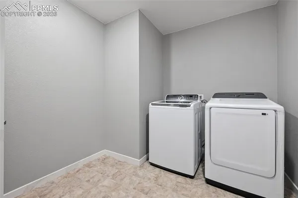 a picture of a bathroom with a shower
