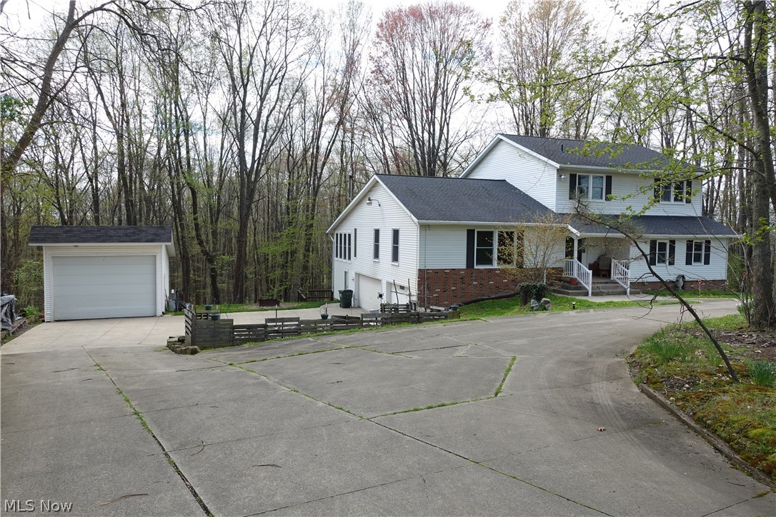 15488 Hatfield Road Rittman, OH 44270 - Photo 1 of 36 View of front of property with an outdoor structure and a garage
