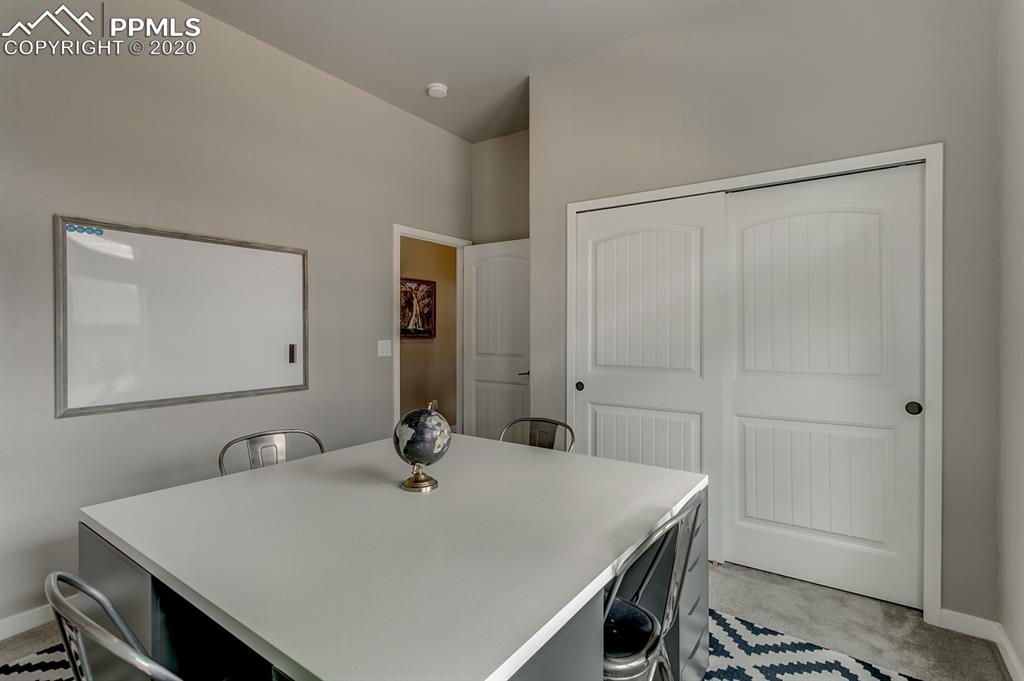 16430 Dancing Bear Lane Monument, CO 80132 - Photo 29 of 50 a bathroom with a sink and a mirror