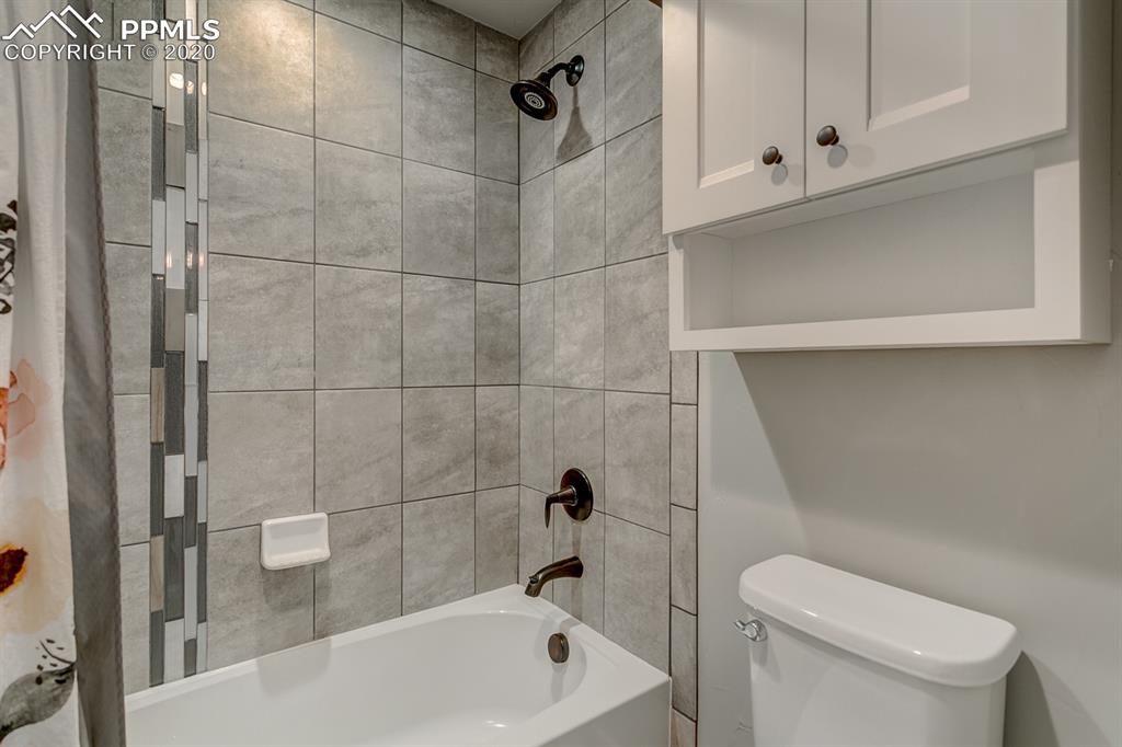 16430 Dancing Bear Lane Monument, CO 80132 - Photo 42 of 50 a bathroom with a toilet and shower