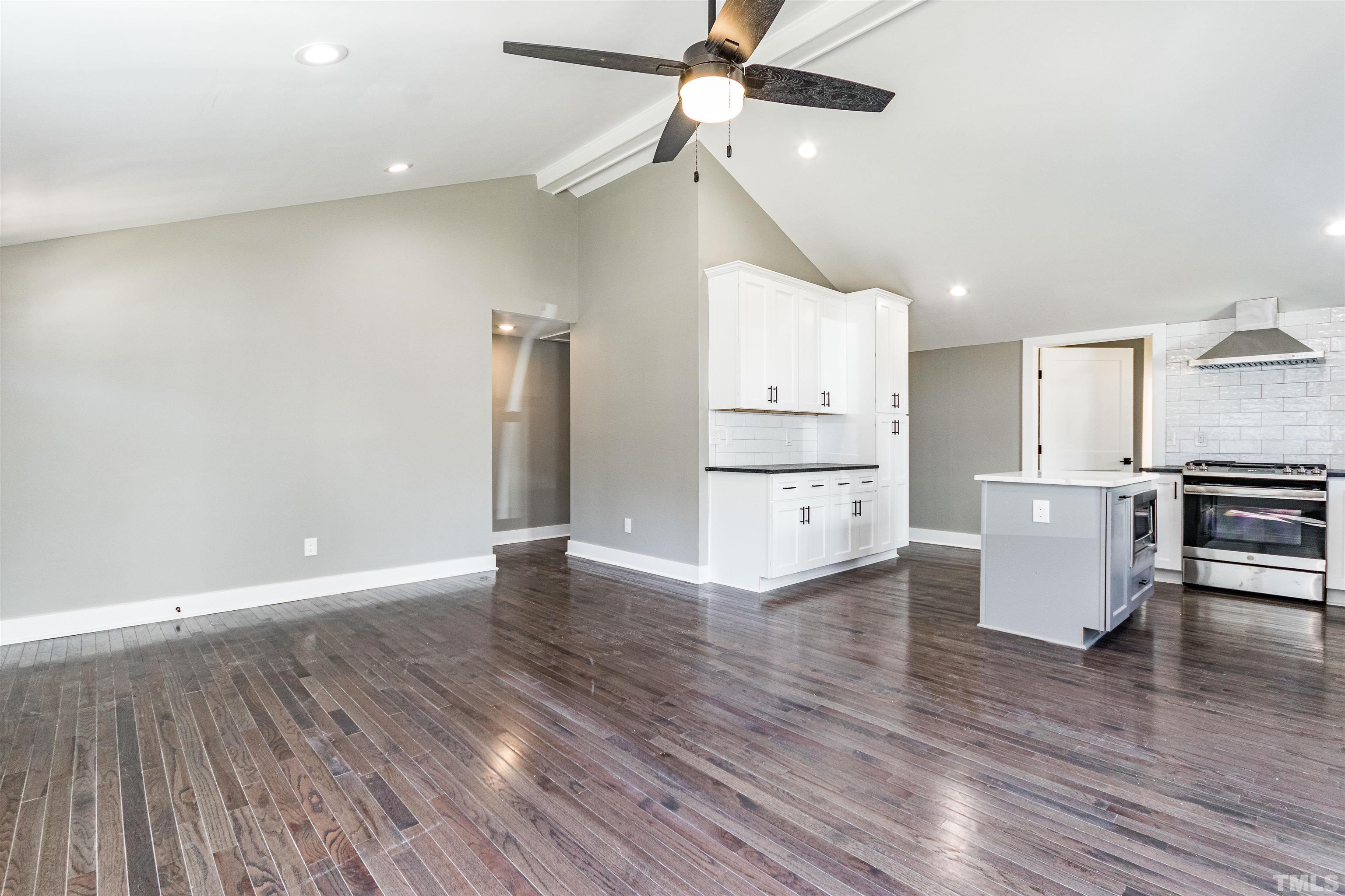 824 Coleman Street Raleigh, NC 27610 - Photo 8 of 30 a view of kitchen with cabinets appliances and wooden floor