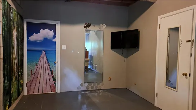 a view of a livingroom with a flat screen tv