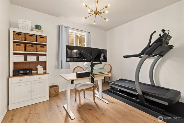 a bedroom with furniture and a window