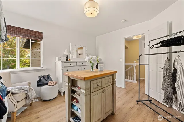 a kitchen with stainless steel appliances granite countertop a stove a refrigerator and a refrigerator