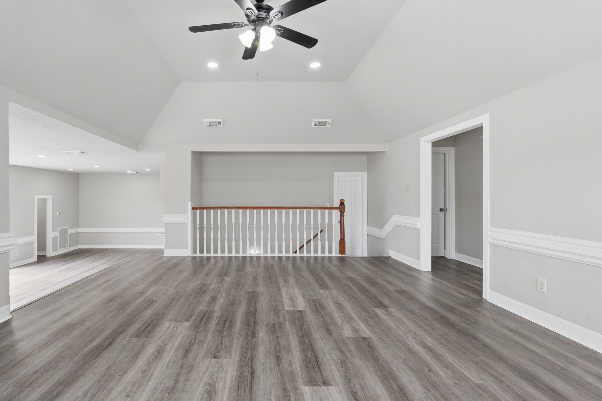 7611 Naremore Drive Spring, TX 77379 - Photo 33 of 48 Elevated Living room with access to the second set of stairs!
