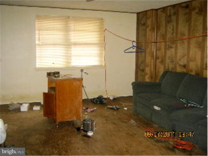 1318 Rainer Road Brookhaven, PA 19015 - Photo 3 of 13 a view of a workspace with furniture