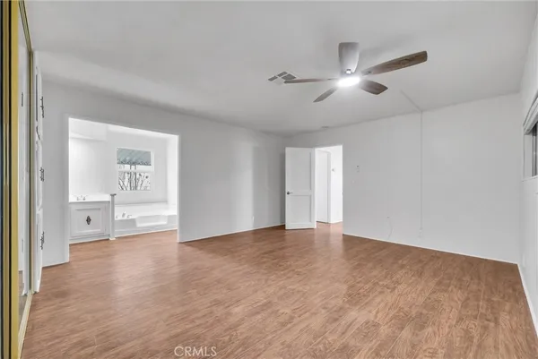 a view of an empty room and window