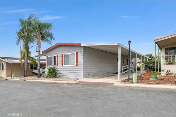 a room with furniture and wooden floor