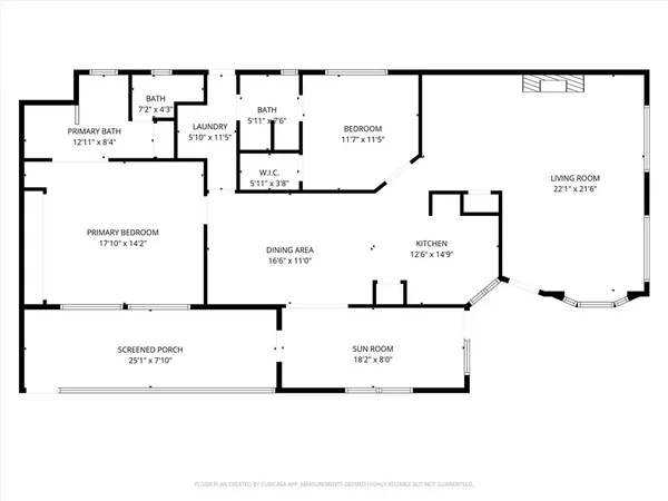 a room with pool table and wooden floor