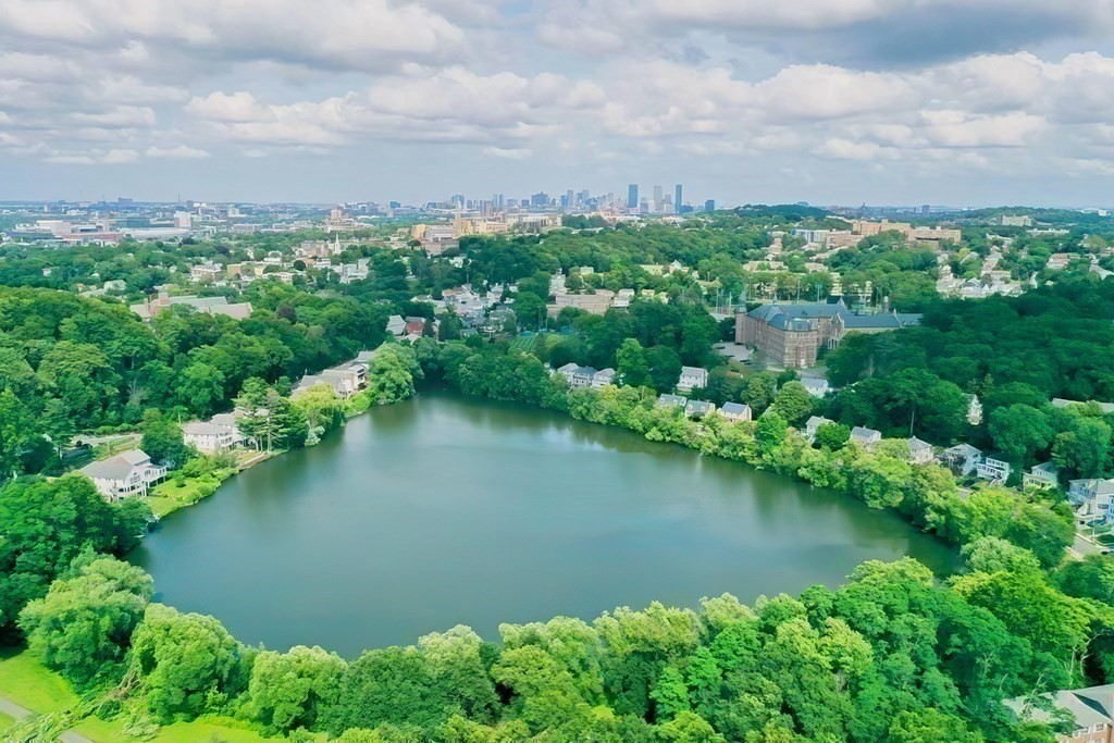 149 Lake Shore Road, Unit 2 Boston, MA 02135 - Photo 30 of 38 an aerial view of a houses with ocean view