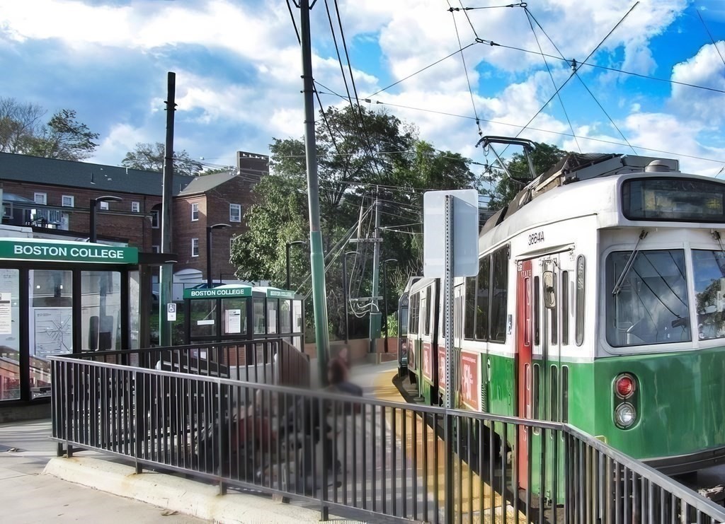 149 Lake Shore Road, Unit 2 Boston, MA 02135 - Photo 36 of 38 a view of a house with a street