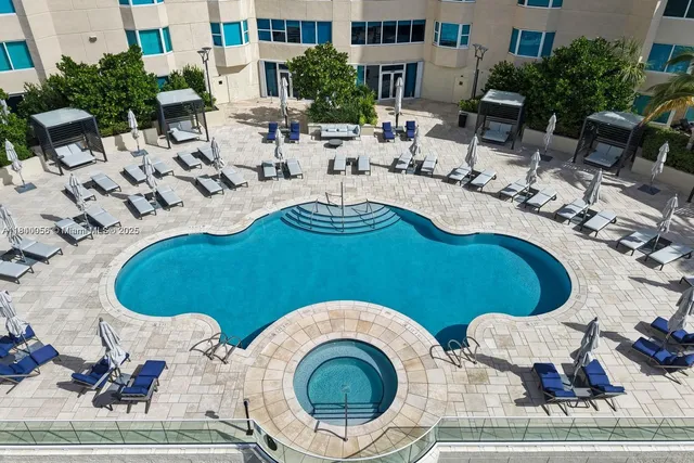 a view of a swimming pool and outdoor space