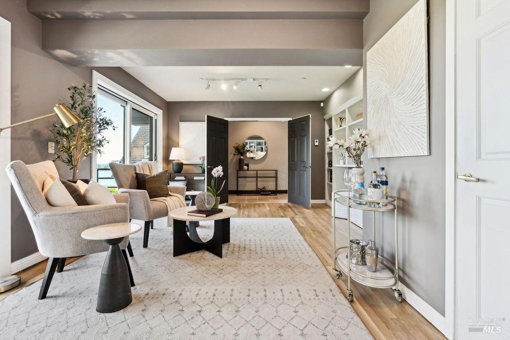 31 Edwards Avenue Sausalito, CA 94965 - Photo 33 of 51 a living room with furniture and a large window
