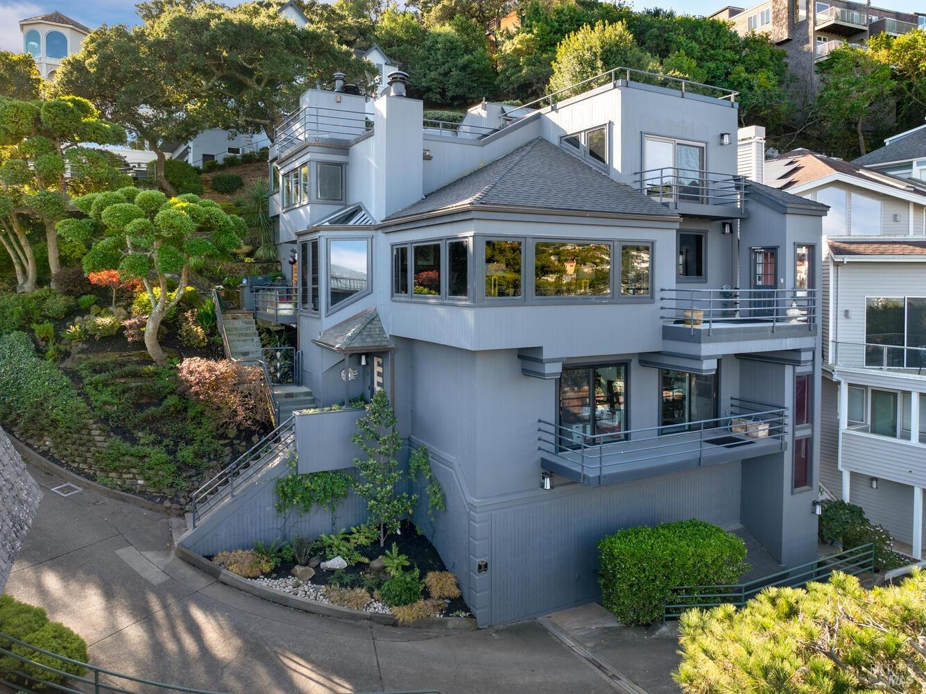 31 Edwards Avenue Sausalito, CA 94965 - Photo 44 of 51 a front view of a house with a yard