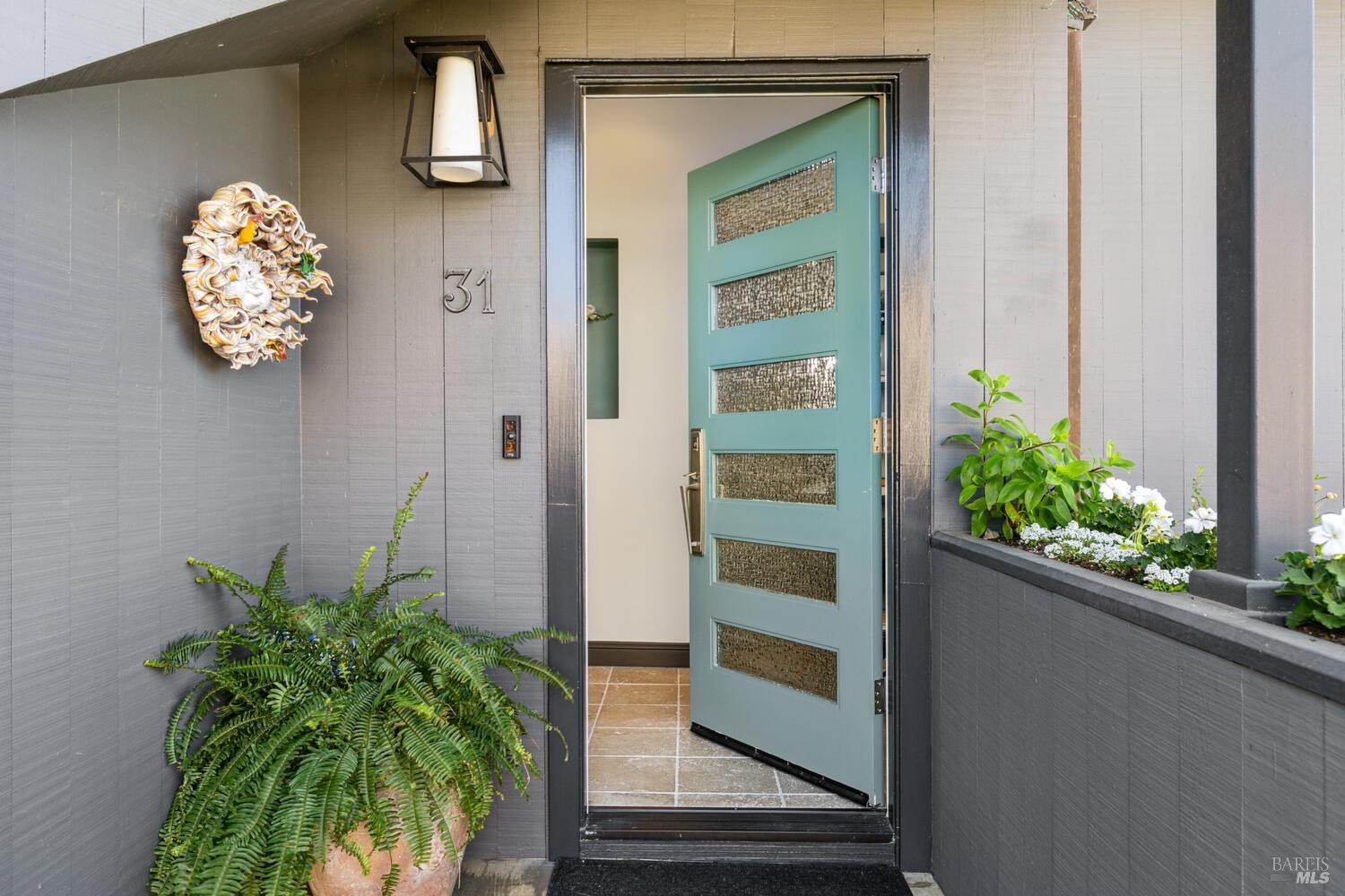 31 Edwards Avenue Sausalito, CA 94965 - Photo 47 of 51 a house with a outdoor seating space