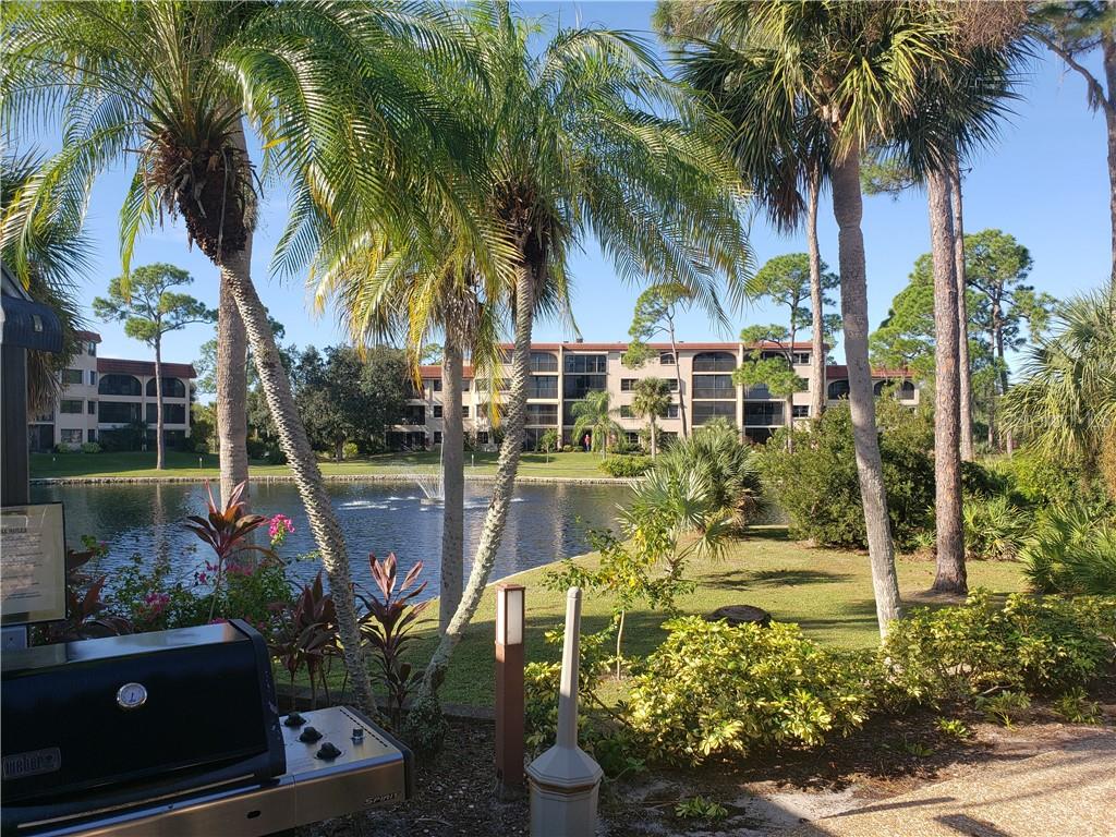 23465 Harbor View Road, Unit 924 Port Charlotte, FL 33980 - Photo 1 of 1 a view of outdoor space yard and swimming pool