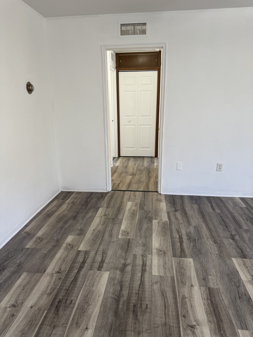 1103 37th St Court Moline, IL 61265 - Photo 6 of 13 a view of a room with wooden floor and a sink