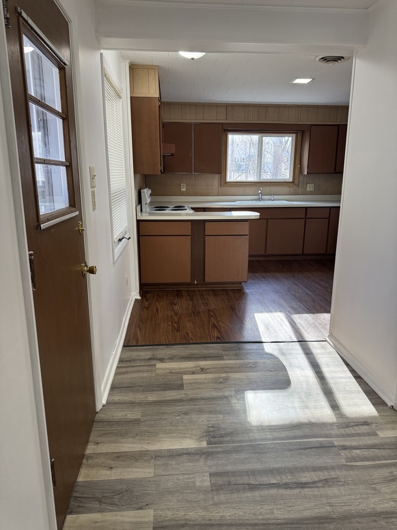 1103 37th St Court Moline, IL 61265 - Photo 7 of 13 a view of a kitchen from the hallway