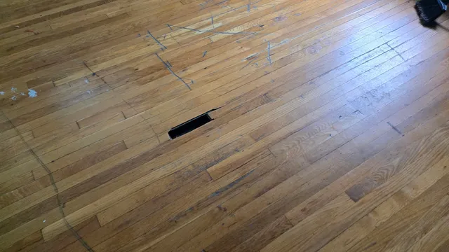 a view of wooden floor in a bathroom