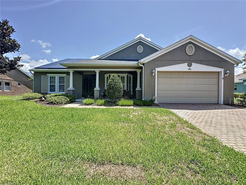 184 Bayou Bend Road Groveland, FL 34736 - Photo 1 of 1 2 1/2 garage, energy efficient, solar-powered.