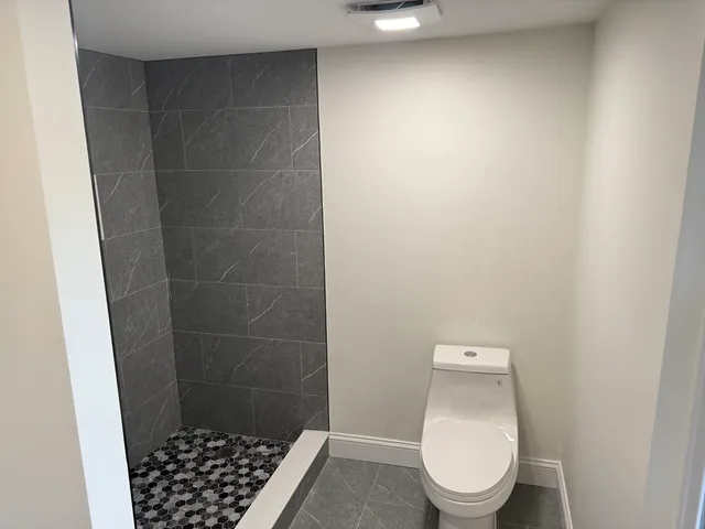 a bathroom with a toilet