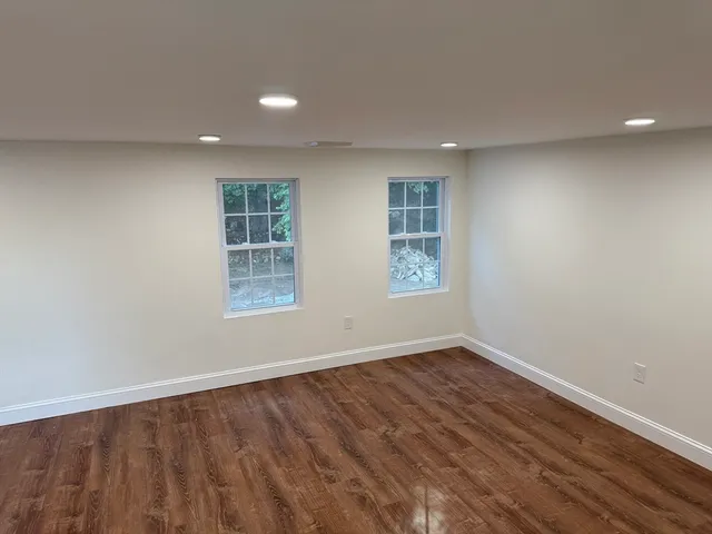 a view of kitchen with wooden floor