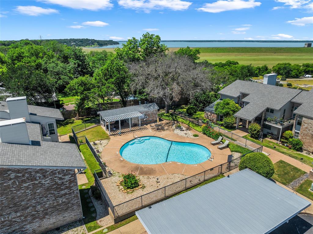2901 Lake Shore Drive, Unit 405 Waco, TX 76708 - Photo 27 of 31 an aerial view of a house with outdoor space patio and swimming pool