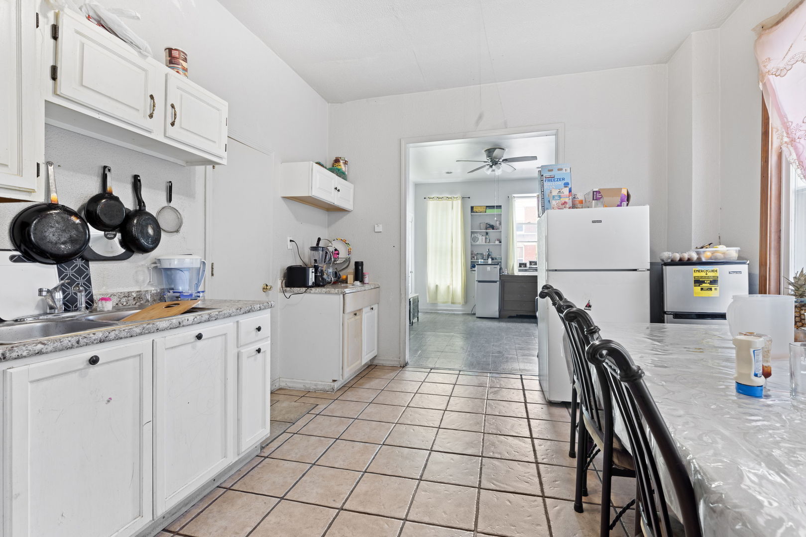 1507 West Erie Street Chicago, IL 60642 - Photo 5 of 24 a kitchen with a sink appliances and cabinets