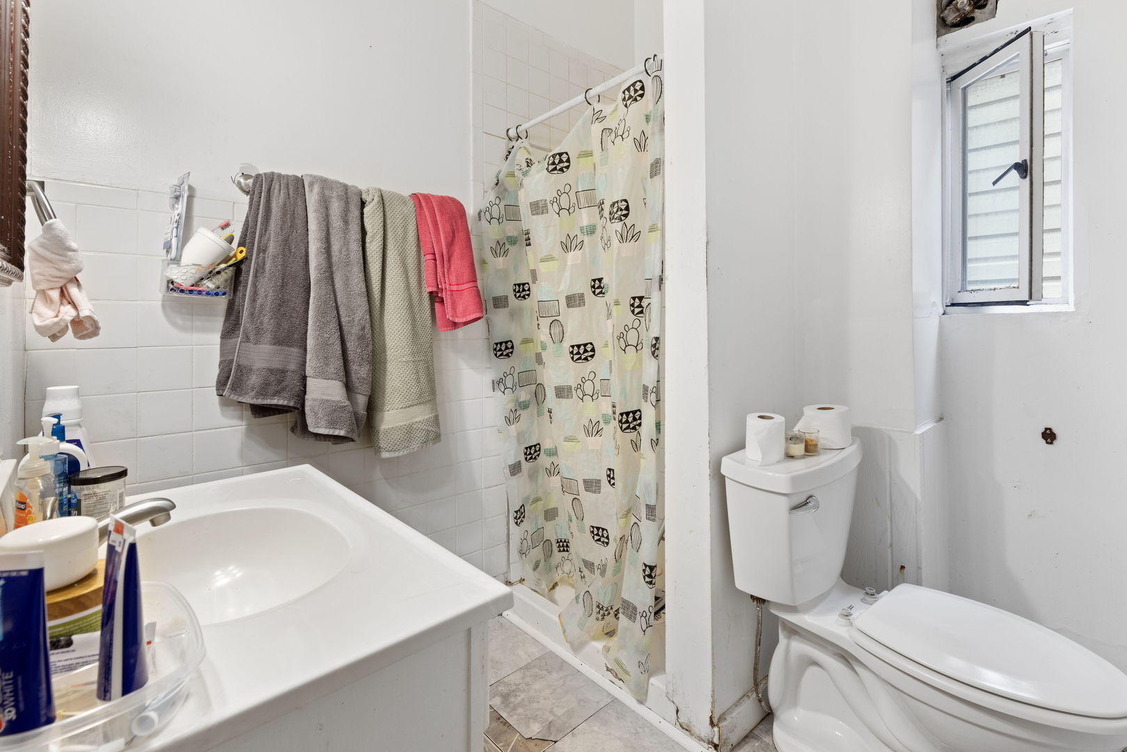 1507 West Erie Street Chicago, IL 60642 - Photo 6 of 24 a bathroom with a sink toilet and shower