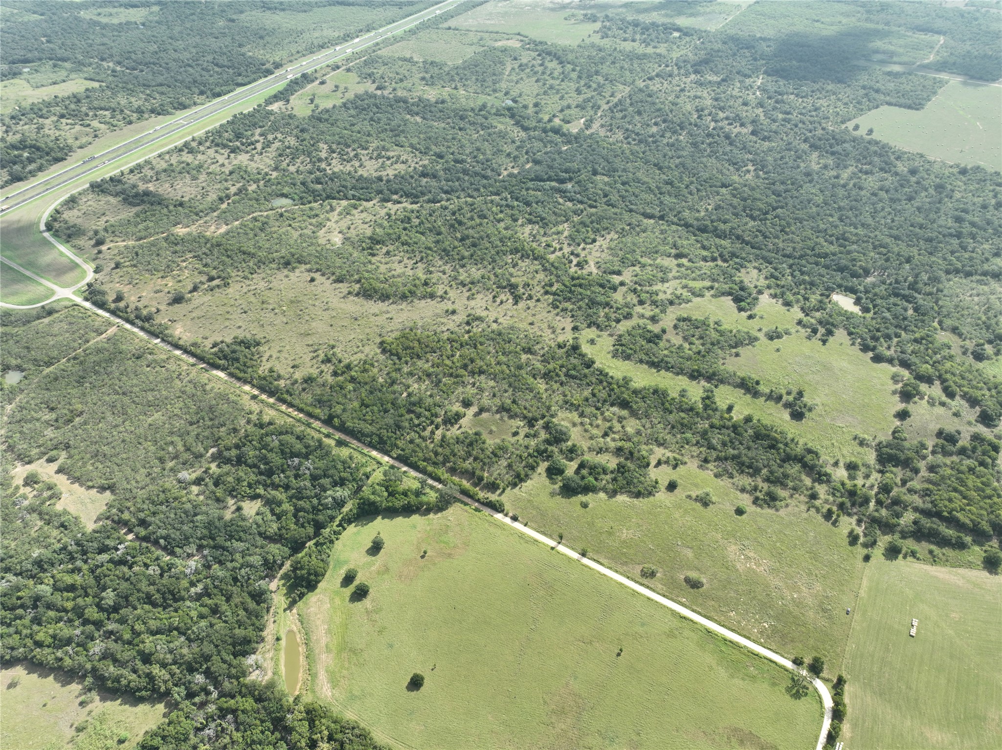 424 Rd Waelder Tx 78629 Road Waelder, TX 78959 - Photo 2 of 25 Overview of rural landscape with property boundaries highlighted