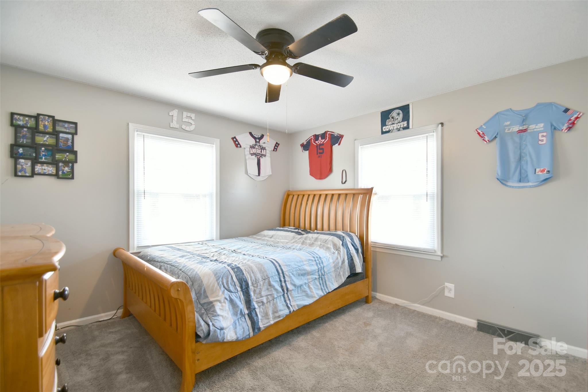 1820 Irish Potato Road Concord, NC 28025 - Photo 19 of 35 a bedroom with a bed and a window