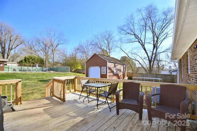 a view of a house with backyard patio and backyard