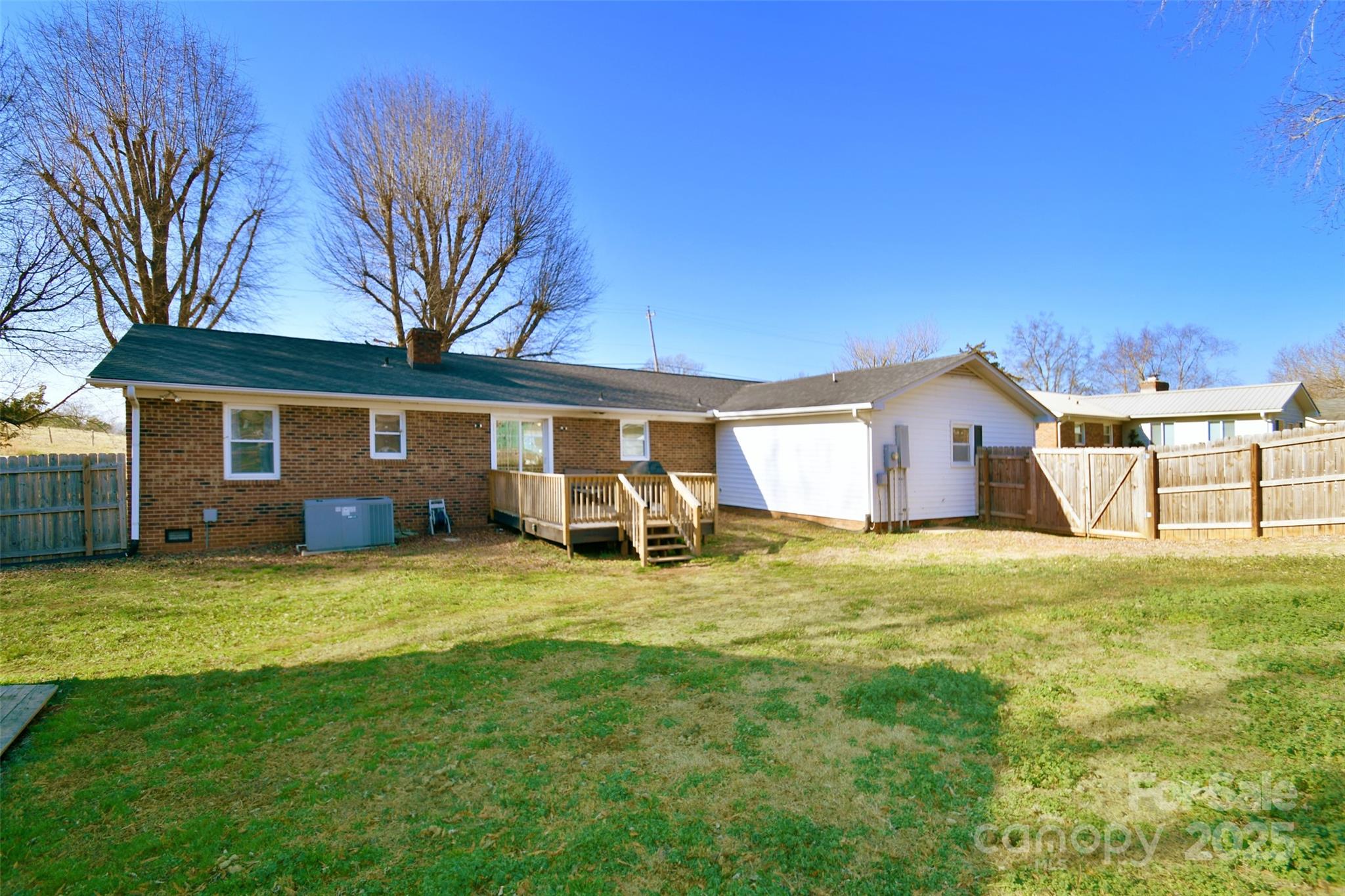 1820 Irish Potato Road Concord, NC 28025 - Photo 28 of 35 a backyard of a house with table and chairs