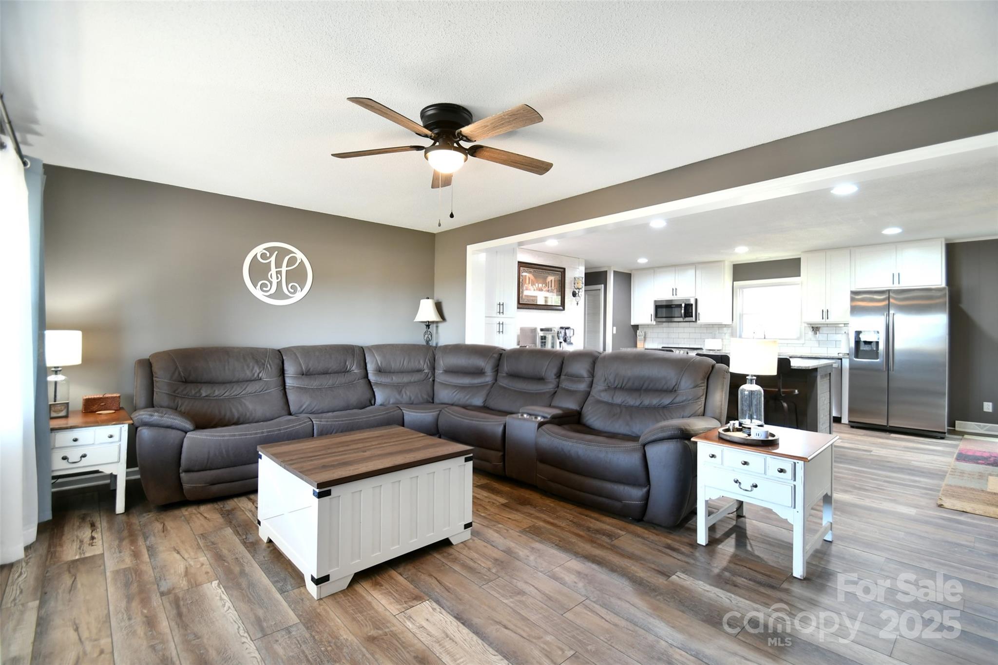 1820 Irish Potato Road Concord, NC 28025 - Photo 4 of 35 a living room with furniture and a wooden floor