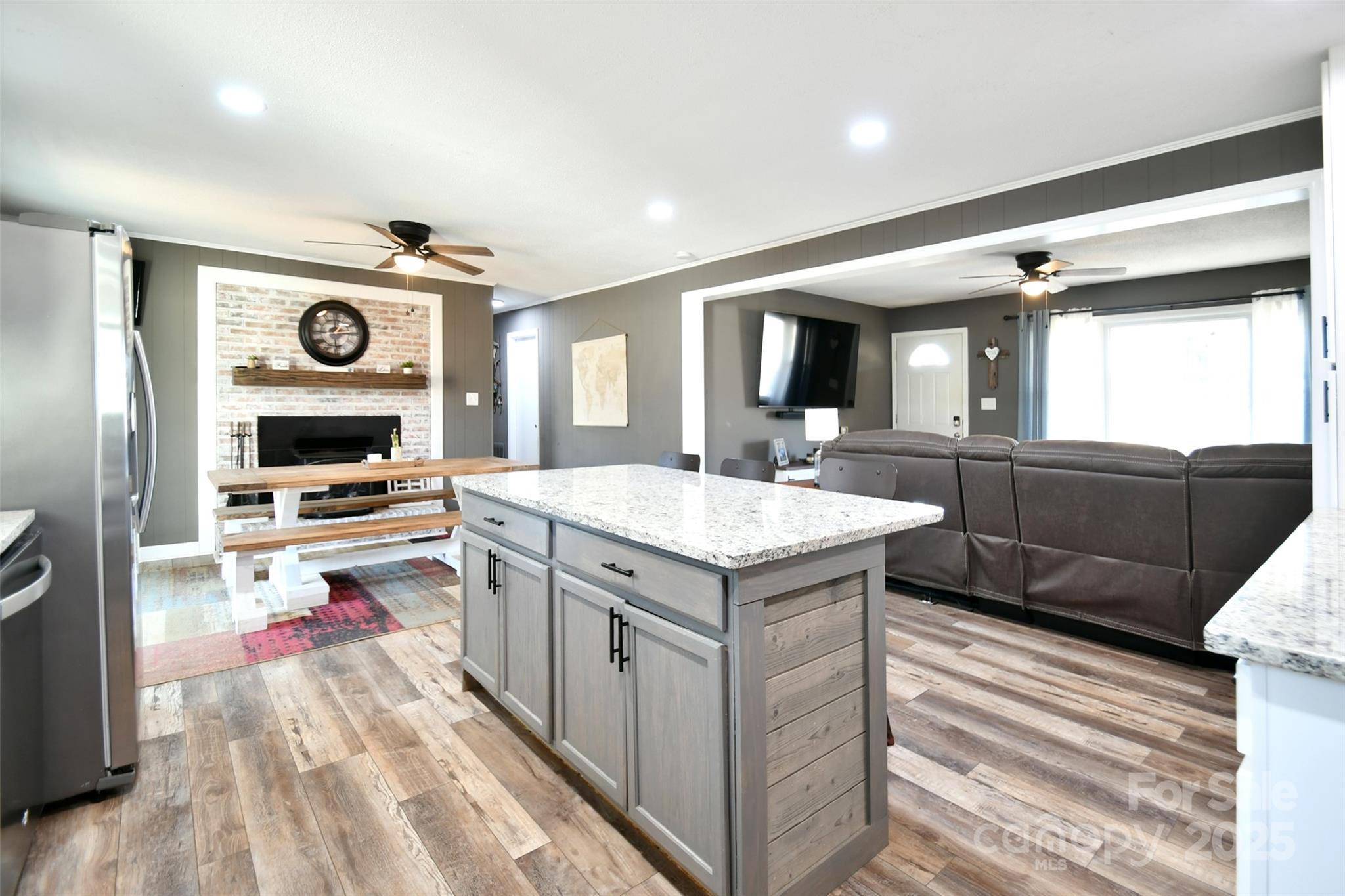 1820 Irish Potato Road Concord, NC 28025 - Photo 9 of 35 a kitchen with a sink and a stove top oven