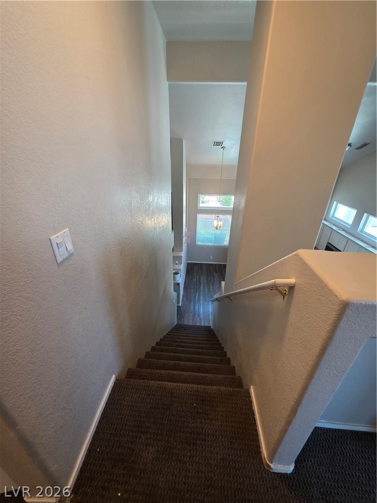 2275 Ramsgate Drive Henderson, NV 89074 - Photo 42 of 84 Natural light floods this multi-level home, featuring a captivating staircase and elegant skylights.