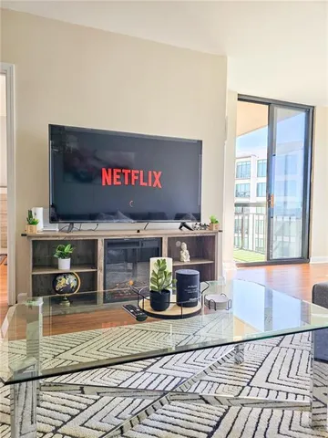a lobby with furniture and rug