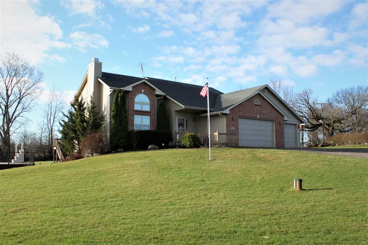 1760 South Weldon Road Rockford, IL 61102 - Photo 1 of 22 a front view of a house with a yard