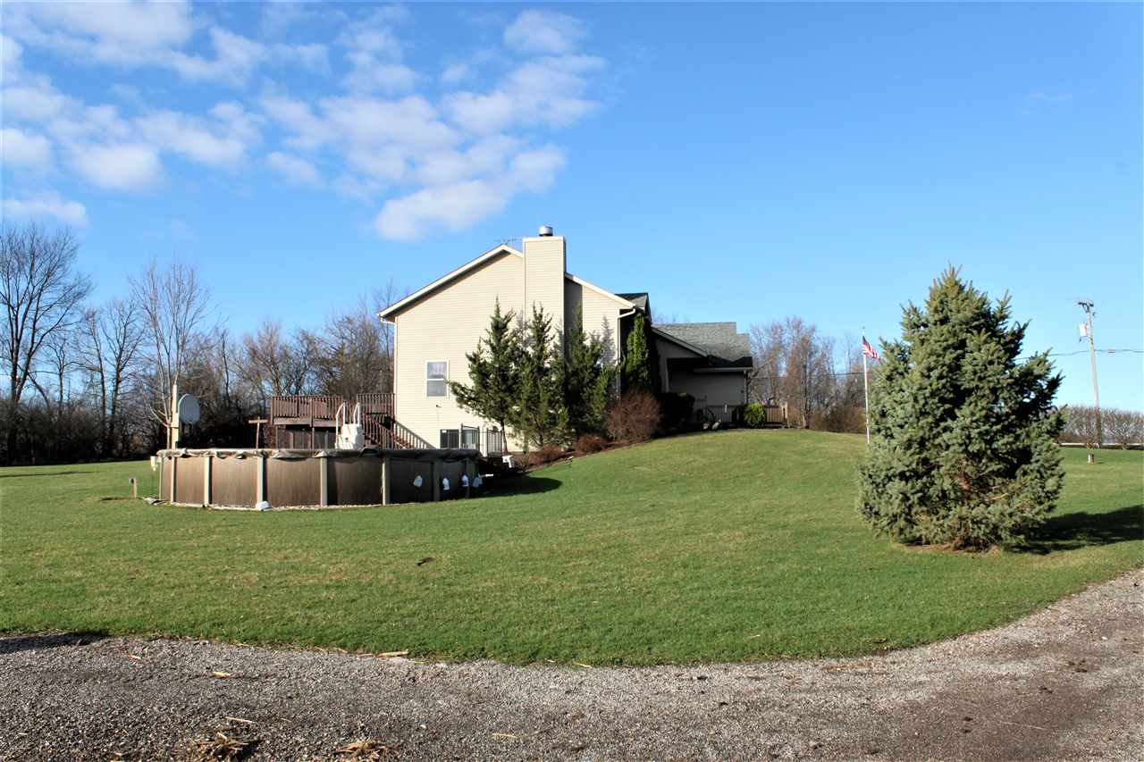 1760 South Weldon Road Rockford, IL 61102 - Photo 19 of 22 a view of a house with a big yard