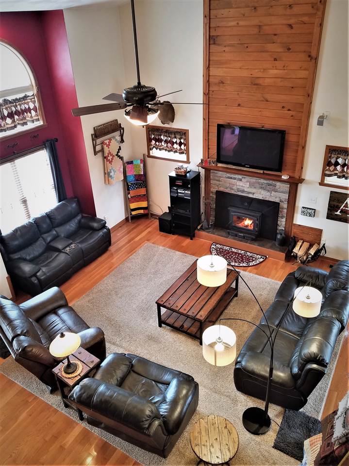 1760 South Weldon Road Rockford, IL 61102 - Photo 2 of 22 a living room with furniture and a fireplace