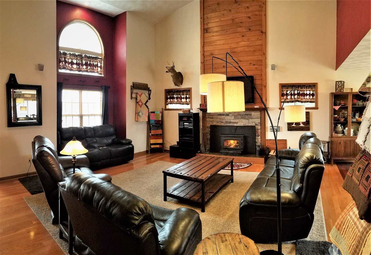 1760 South Weldon Road Rockford, IL 61102 - Photo 3 of 22 a living room with furniture and a fireplace