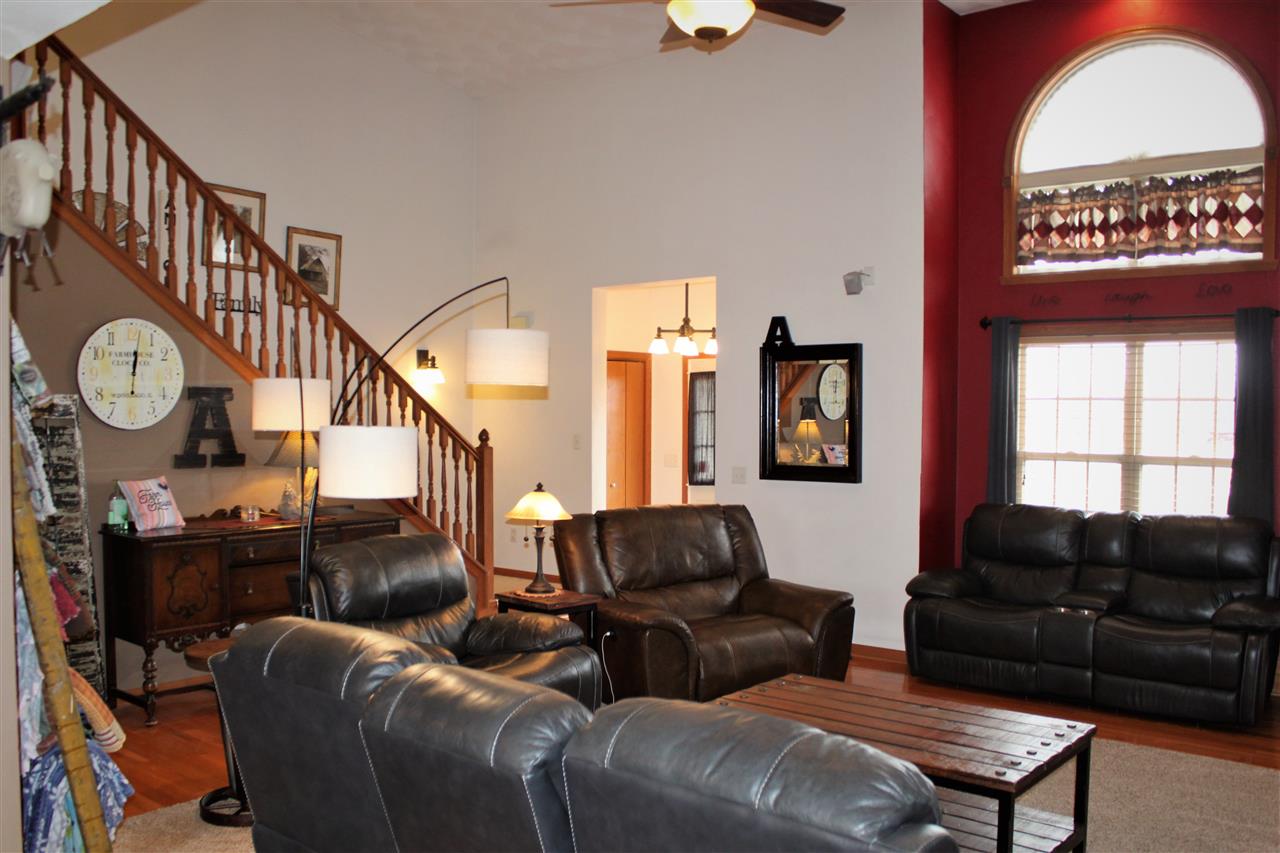 1760 South Weldon Road Rockford, IL 61102 - Photo 4 of 22 a living room with furniture a rug and a window
