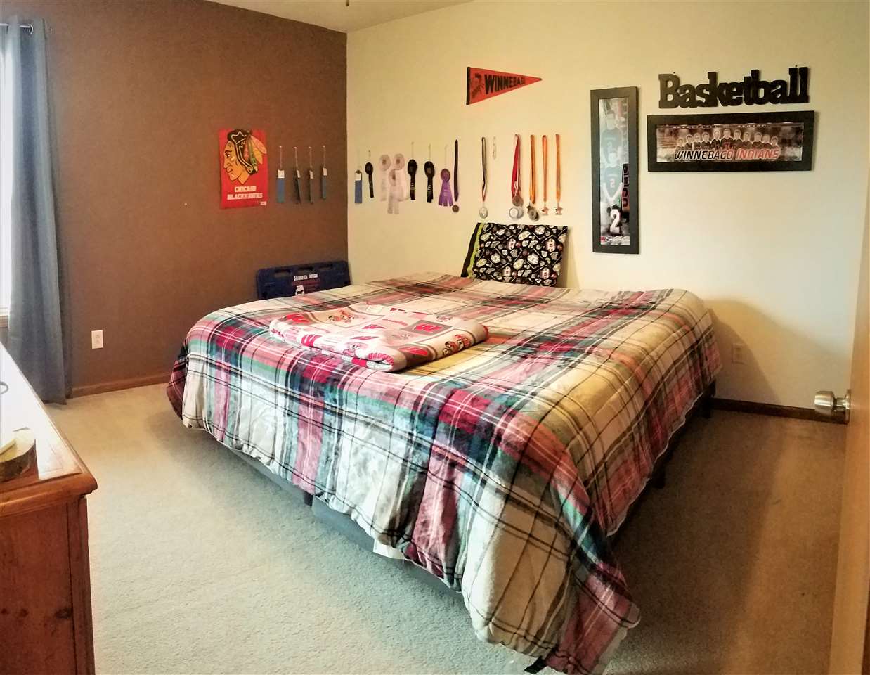 1760 South Weldon Road Rockford, IL 61102 - Photo 10 of 22 a bedroom with a bed and a book shelf