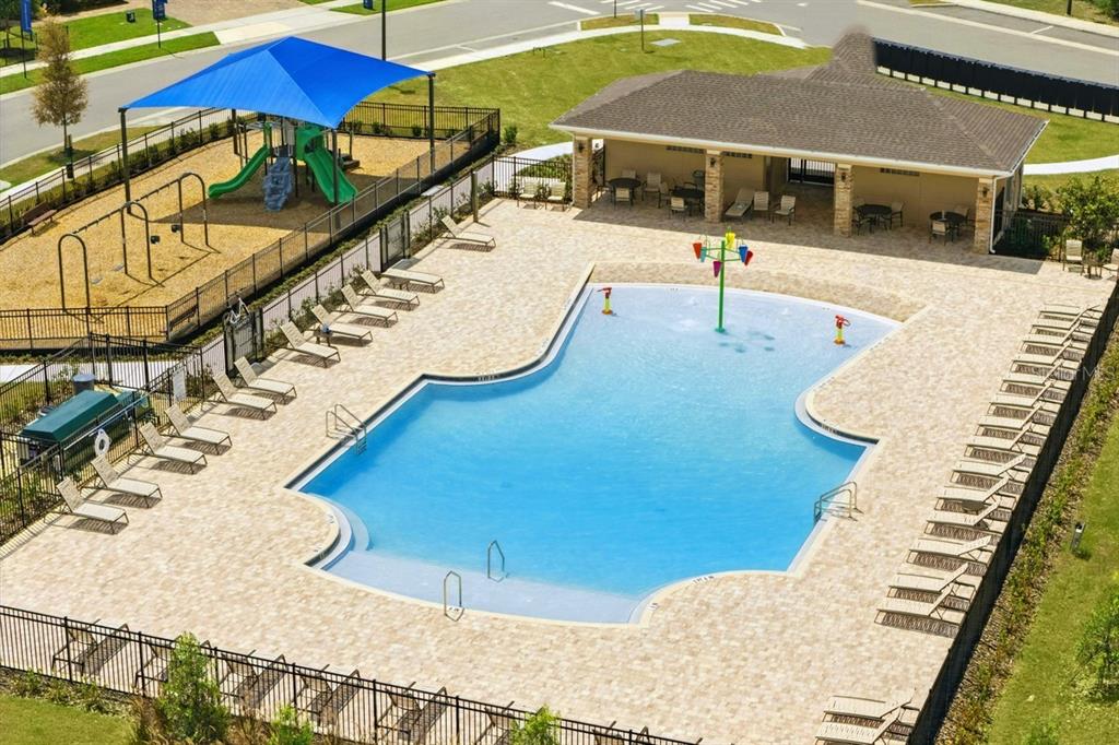 1258 Happy Forest Loop DeLand, FL 32720 - Photo 3 of 4 a view of swimming pool with chairs