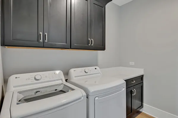 a front view of residential houses with street