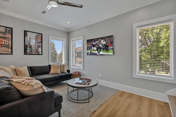 a living room with furniture and a window