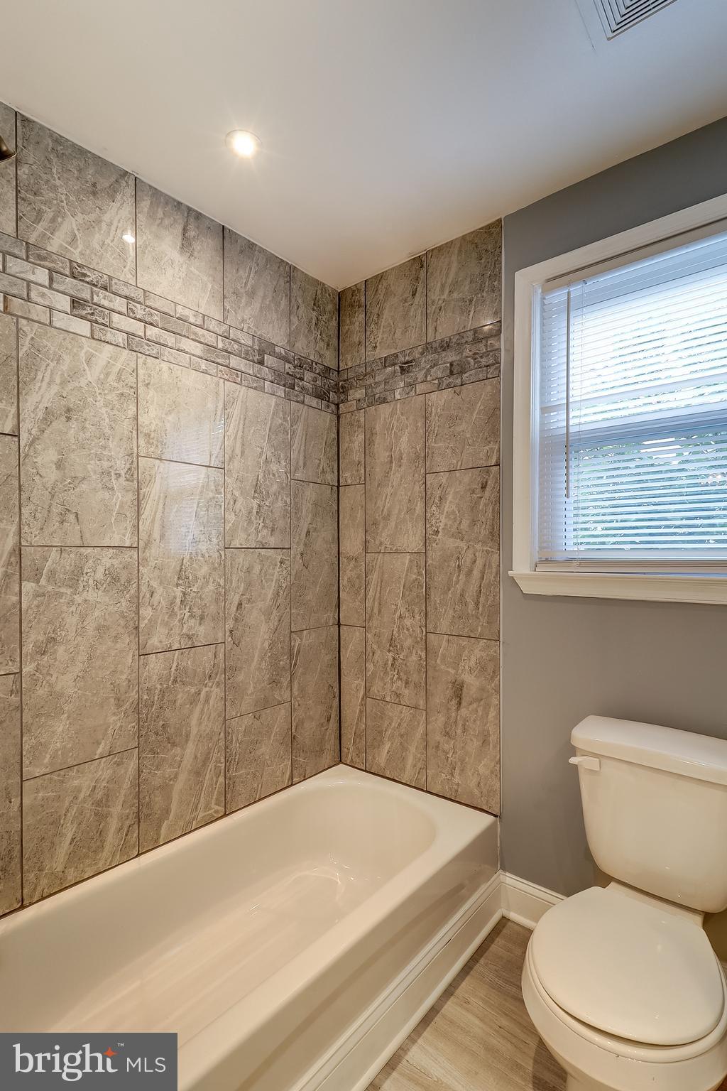322 Townsend Road Baltimore, MD 21221 - Photo 13 of 37 Main Level Bath- New Ceramic Tile