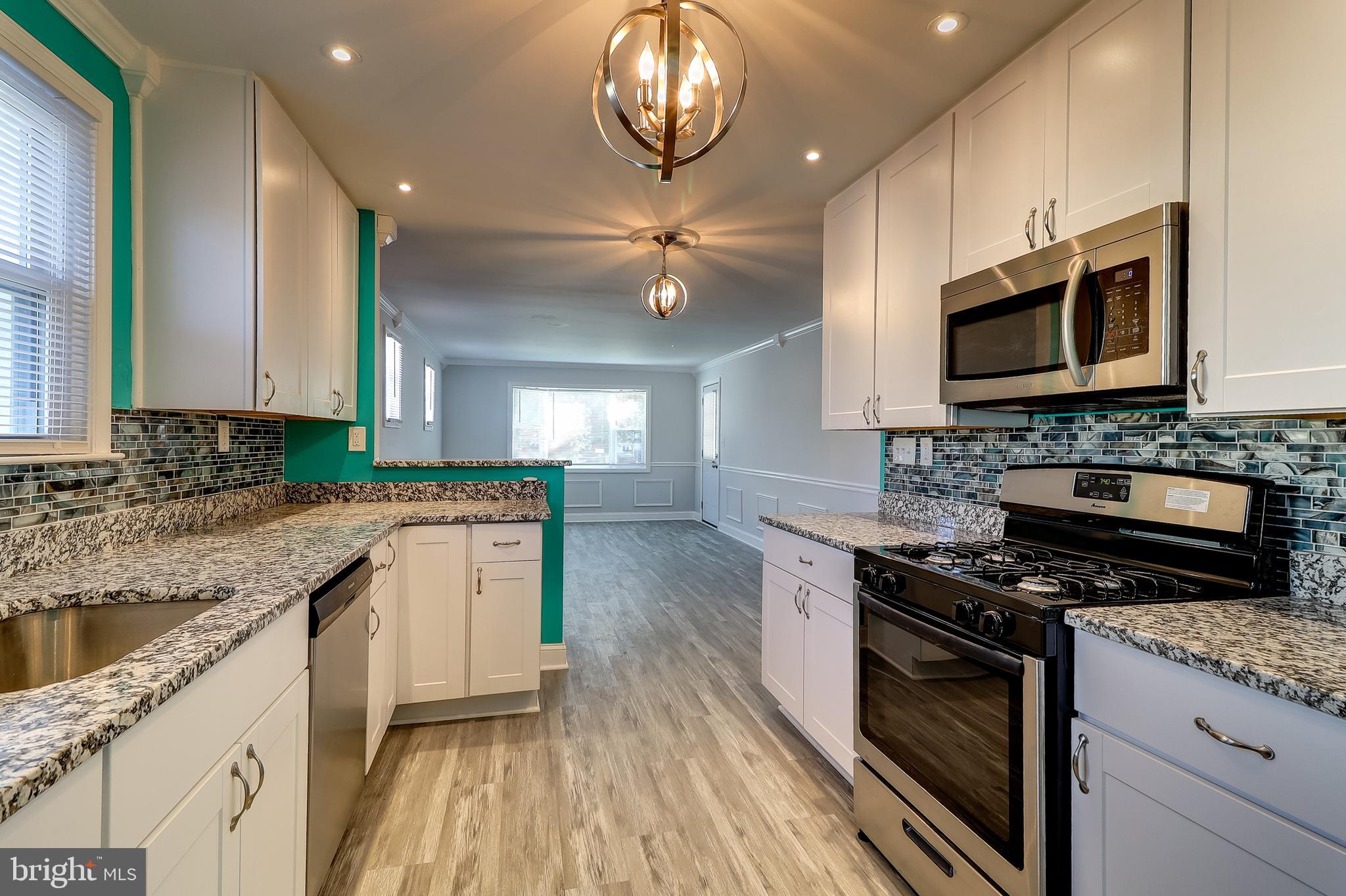 322 Townsend Road Baltimore, MD 21221 - Photo 6 of 37 Kitchen- New Flooring Pocket Lighting