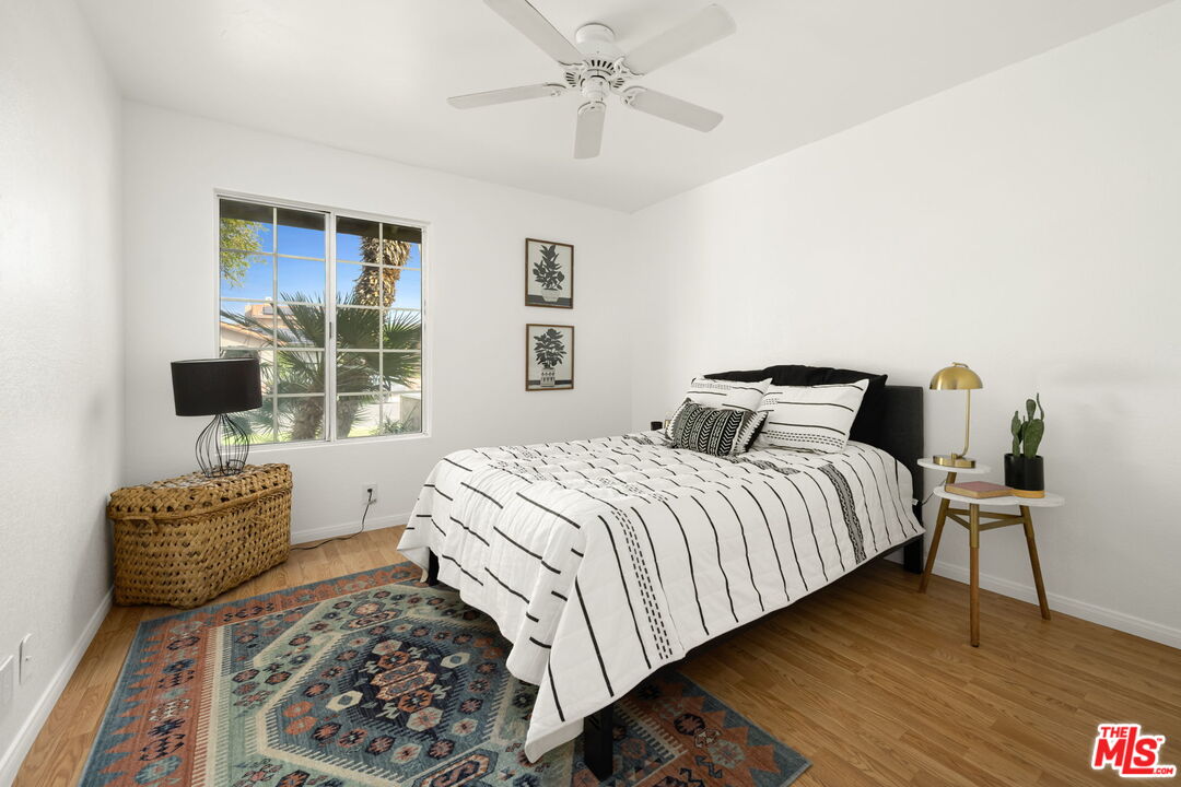 68305 Encinitas Road Cathedral City, CA 92234 - Photo 31 of 33 a bedroom with bed and a window