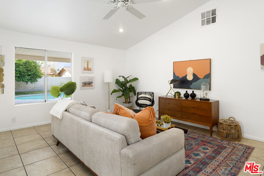 68305 Encinitas Road Cathedral City, CA 92234 - Photo 8 of 33 a living room with furniture and a window